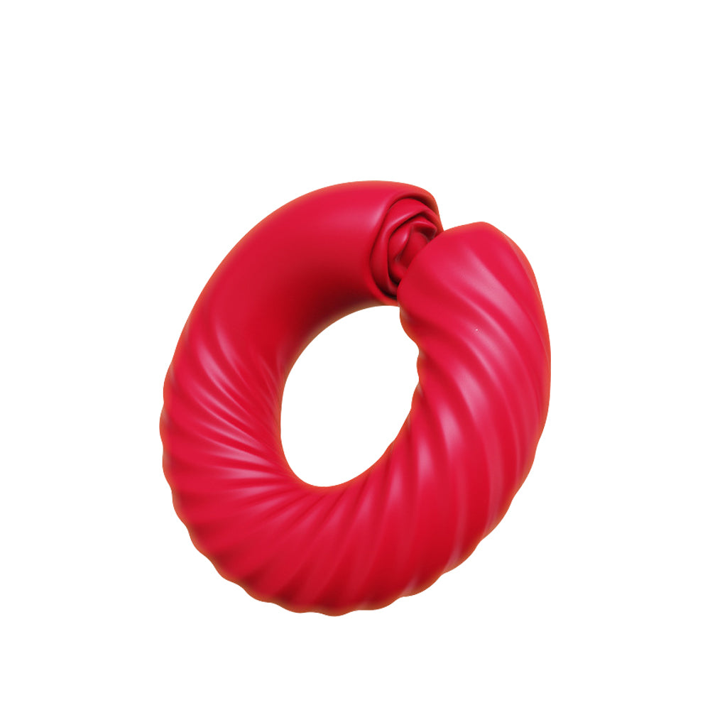 Red rotating silicone cock ring vibrator showing flexible ergonomic wearable pleasure design