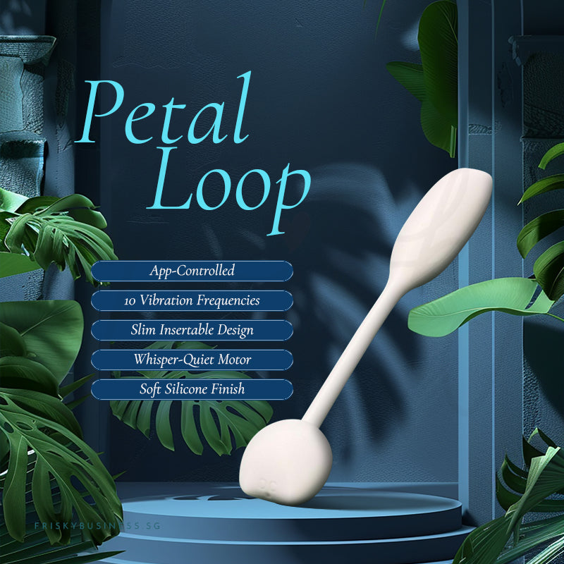 Petal Loop title graphic with the ivory vibrator on a stand among tropical leaves