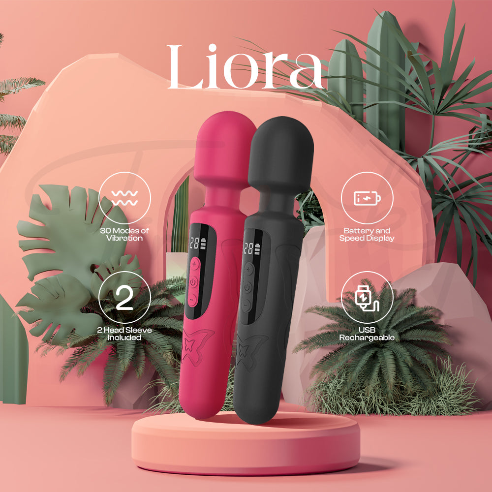 Liora AV wand displayed on a stand with plants in soft pastel background.