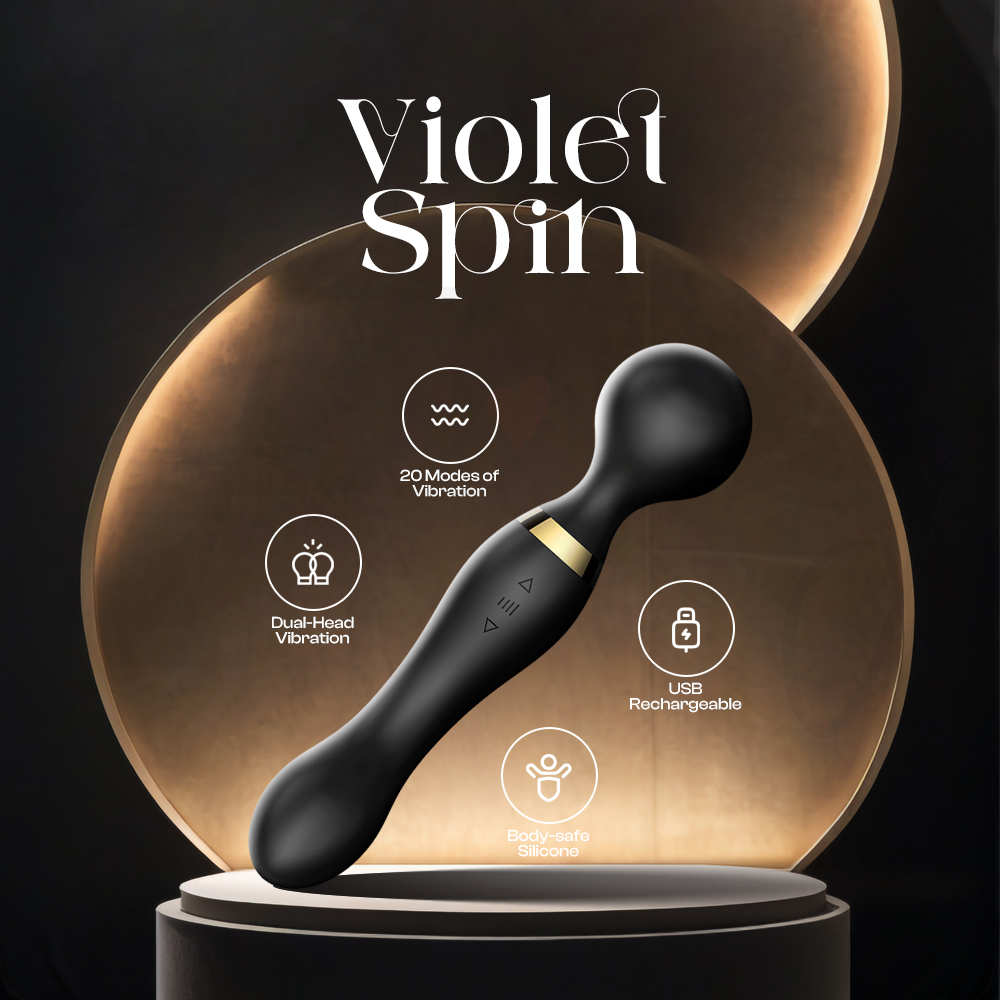 Elegant Violet Spin dual-ended wand displayed on luxury stage with soft lighting and modern design