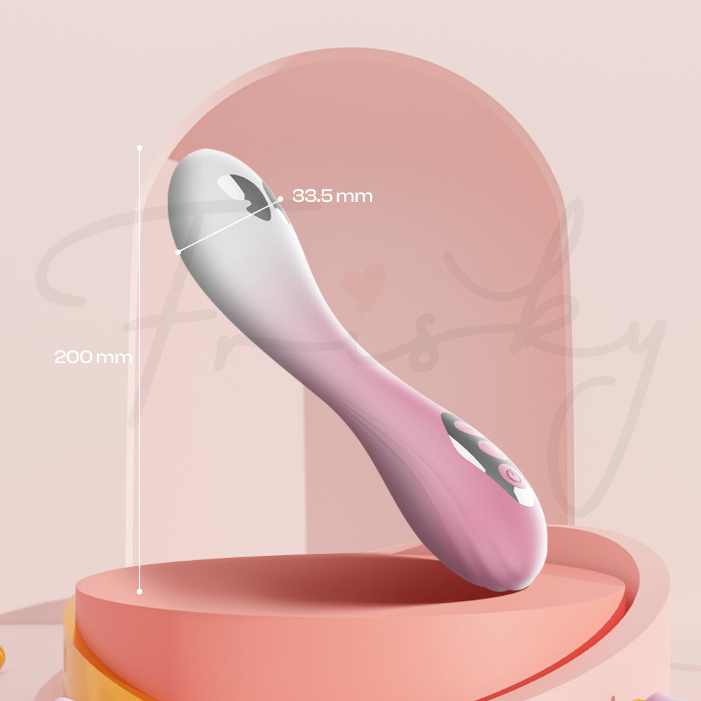 Pink and white Electric Shock G-Spot Vibrator on a pink platform with measurements indicated.