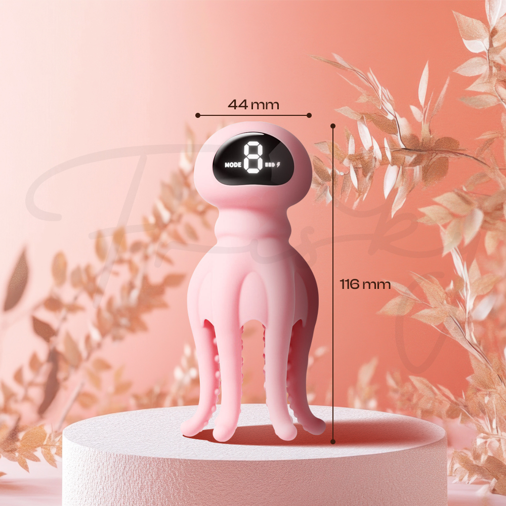 Close-up of pink suction vibrator showing smooth ergonomic curved body