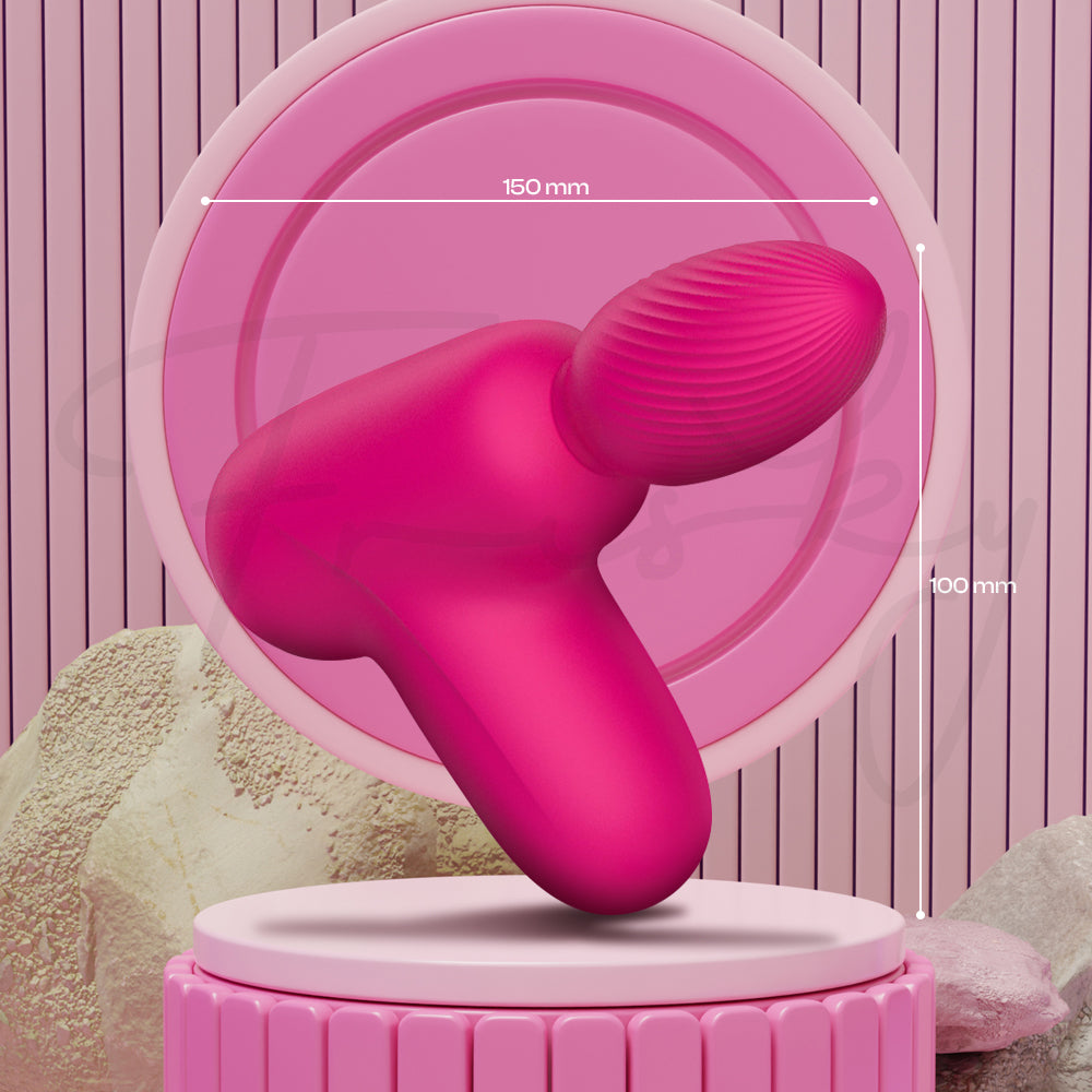 Pink handheld massager on a pink stand with measurement details against a pink background