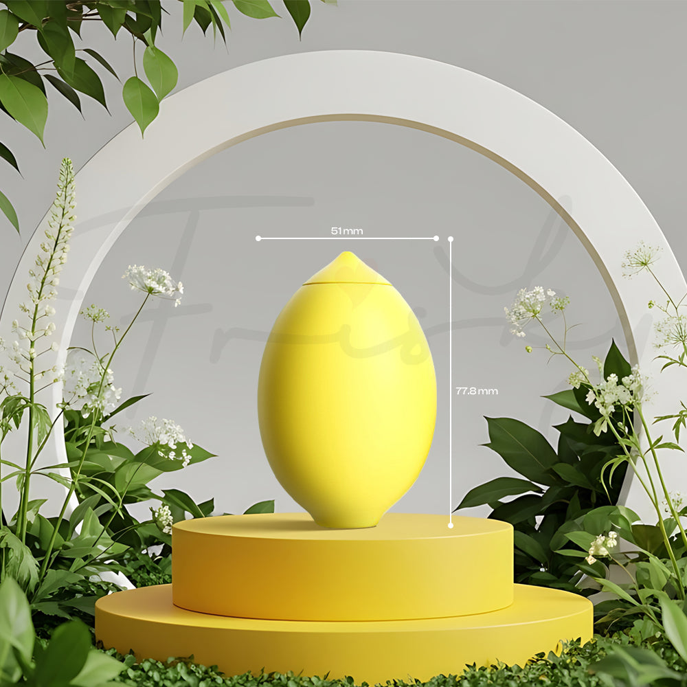 Yellow bullet vibrator styled on round platform with green plants