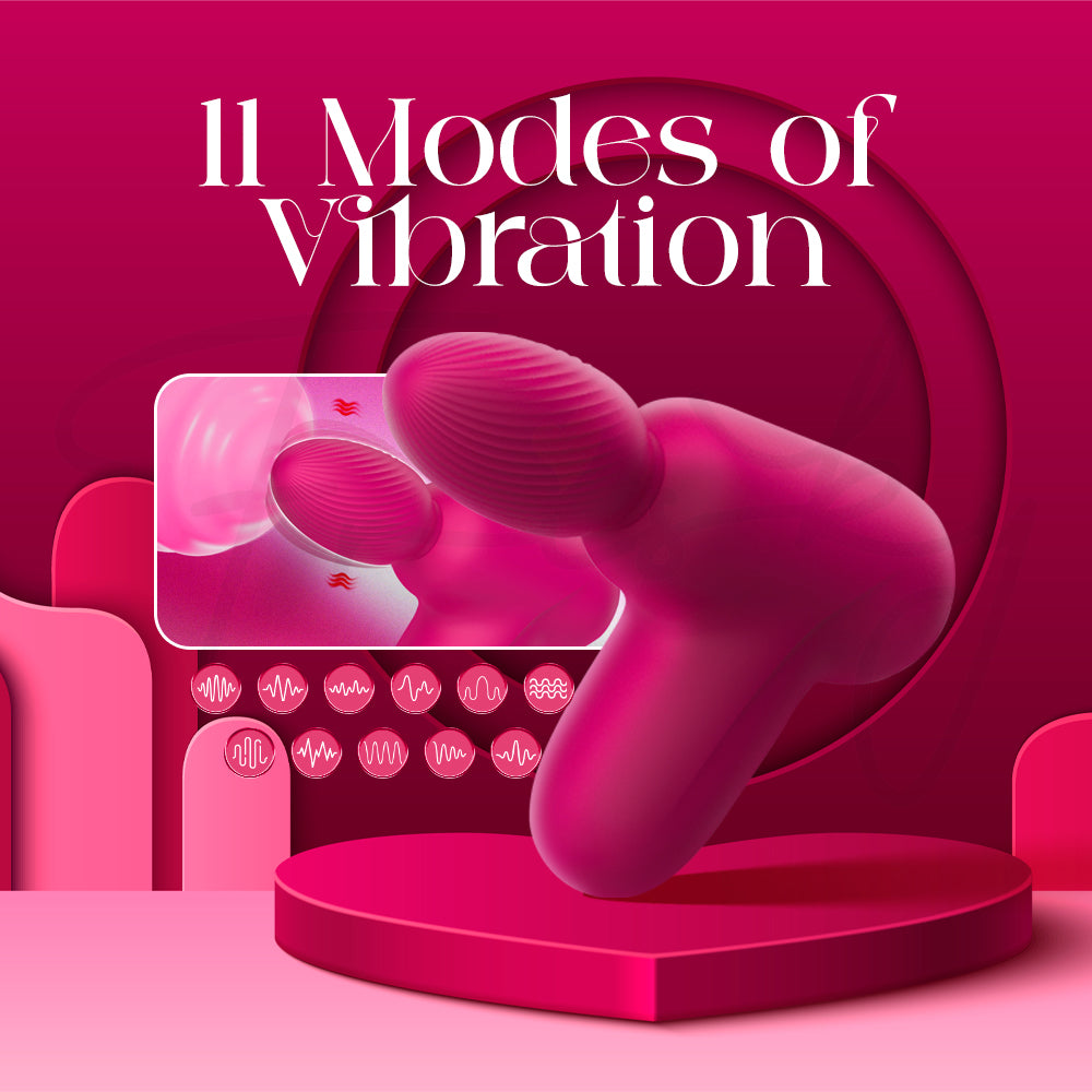 Pink Massage Gun Style Vibrator with Suction with '11 Modes of Vibration' text on a pink background
