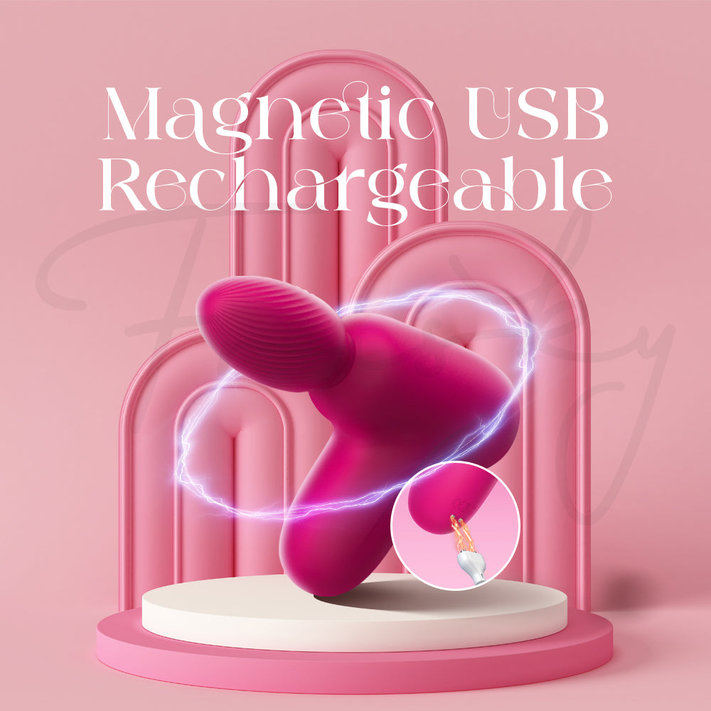 Pink USB rechargeable Massage Gun Style Vibrator with Suction on a pink platform with 'Magnetic USB Rechargeable' text.