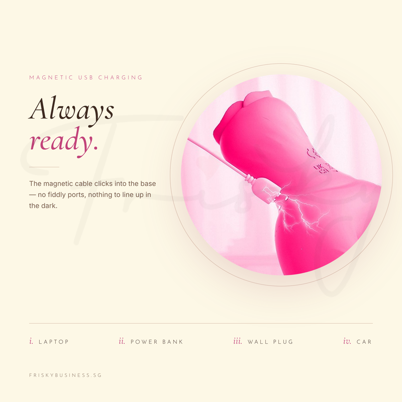Close-up of the pink vibrator's bend inside a circular frame on a cream background