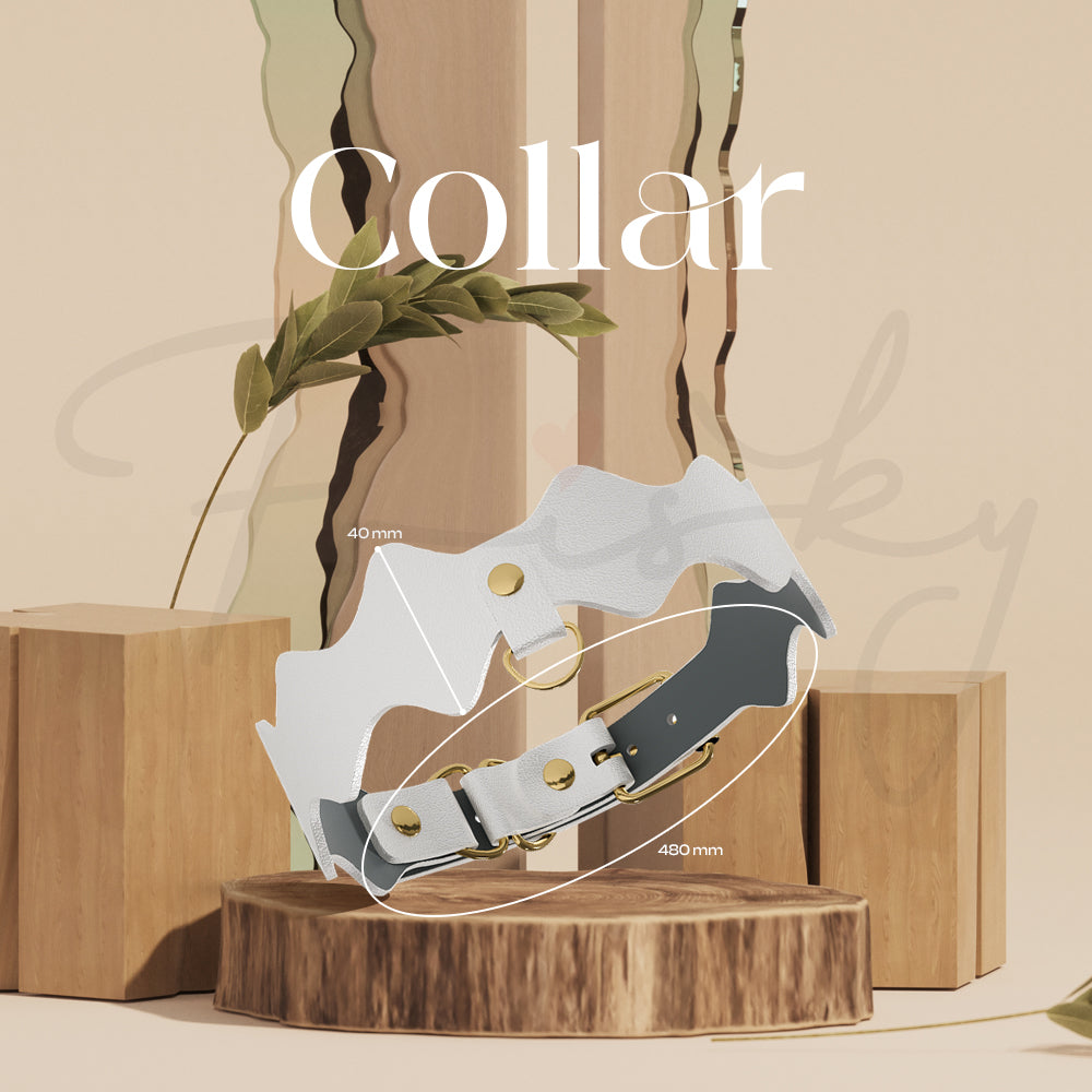 Adjustable white and gold collar displayed on a wooden stand with soft lighting.