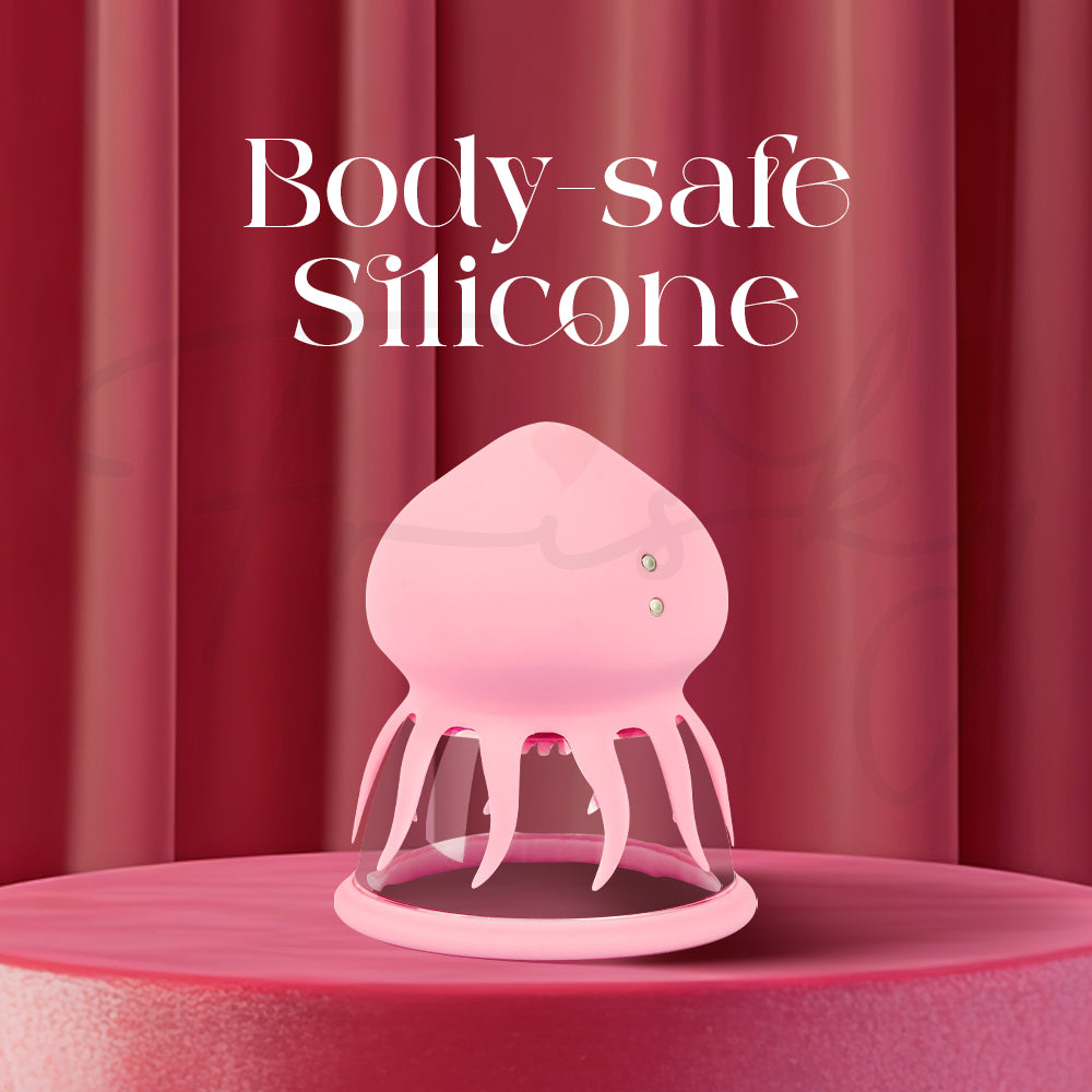 Pink jelly fish-shaped suction vibrator on a red background with 'Body-safe Silicone' text.