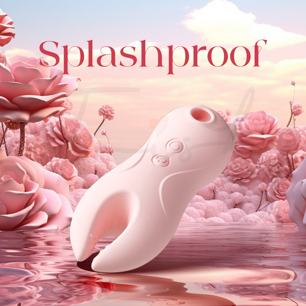 Pink vibrator shown with water splashes to emphasize its splashproof design and easy cleaning.