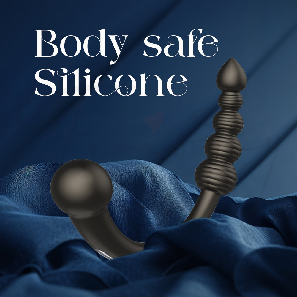 Dual head vibrator on blue fabric with 'Body-safe Silicone' text