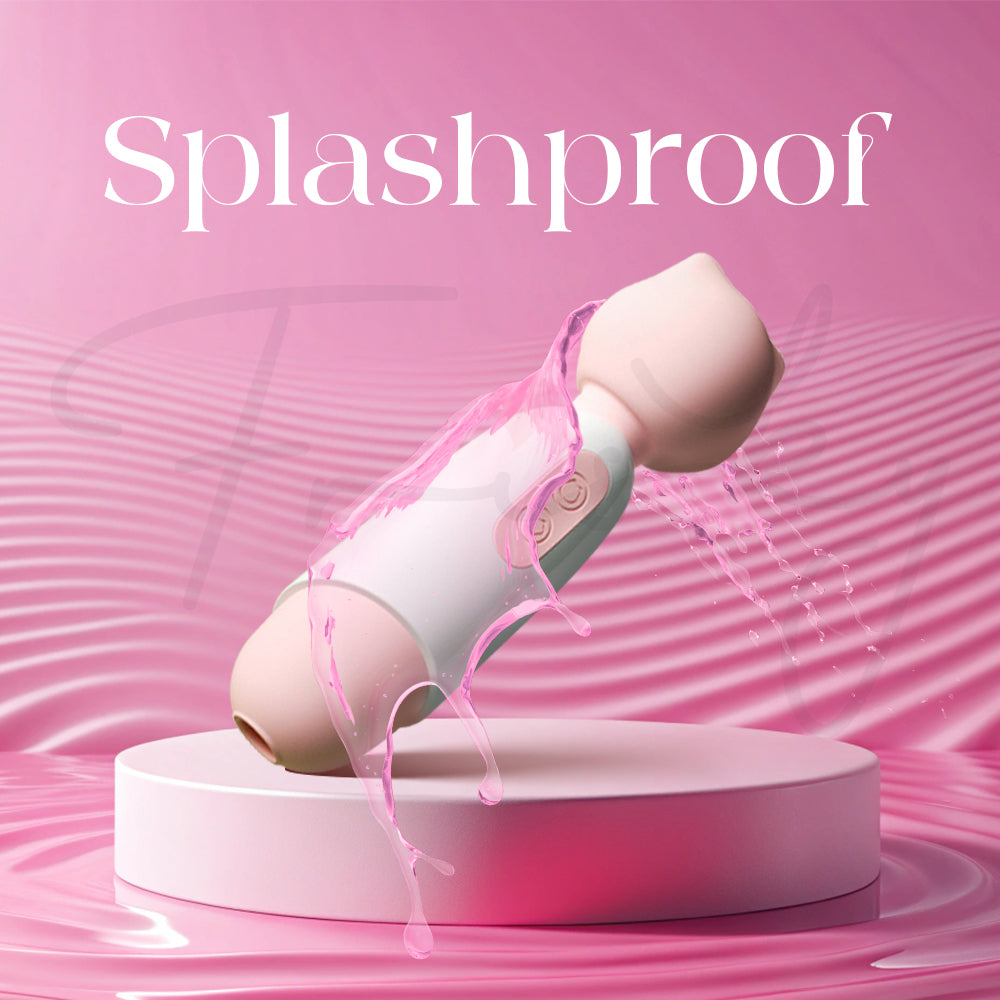 Sakura Purr wand with water splashing over it to show its splashproof design.