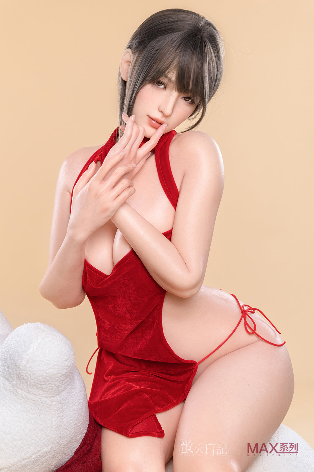 A close-up shot of Firefly Diary Doll 165 cm Max Series Silicone - Yelan in a red velvet side-tie outfit, posing with hands near her face against a neutral background.
