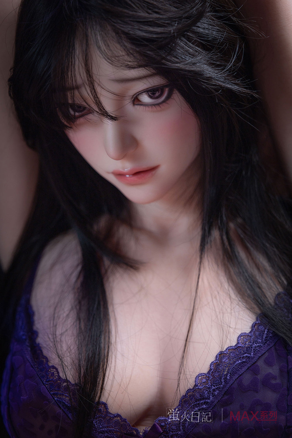 Close-up portrait of the Firefly Diary Doll 165 cm Max Series Silicone - Tiancheng. The doll features realistic facial details, long black hair with soft bangs, and large expressive eyes. She is wearing a purple lace top with thin straps, looking downward with a soft, neutral expression.