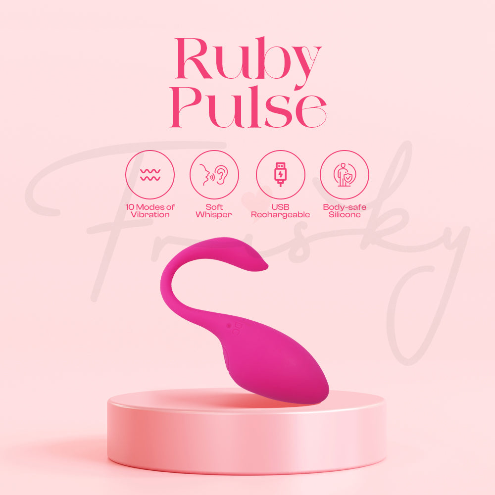 Ruby Pulse wearable vibrator displayed on pedestal with elegant soft pink theme