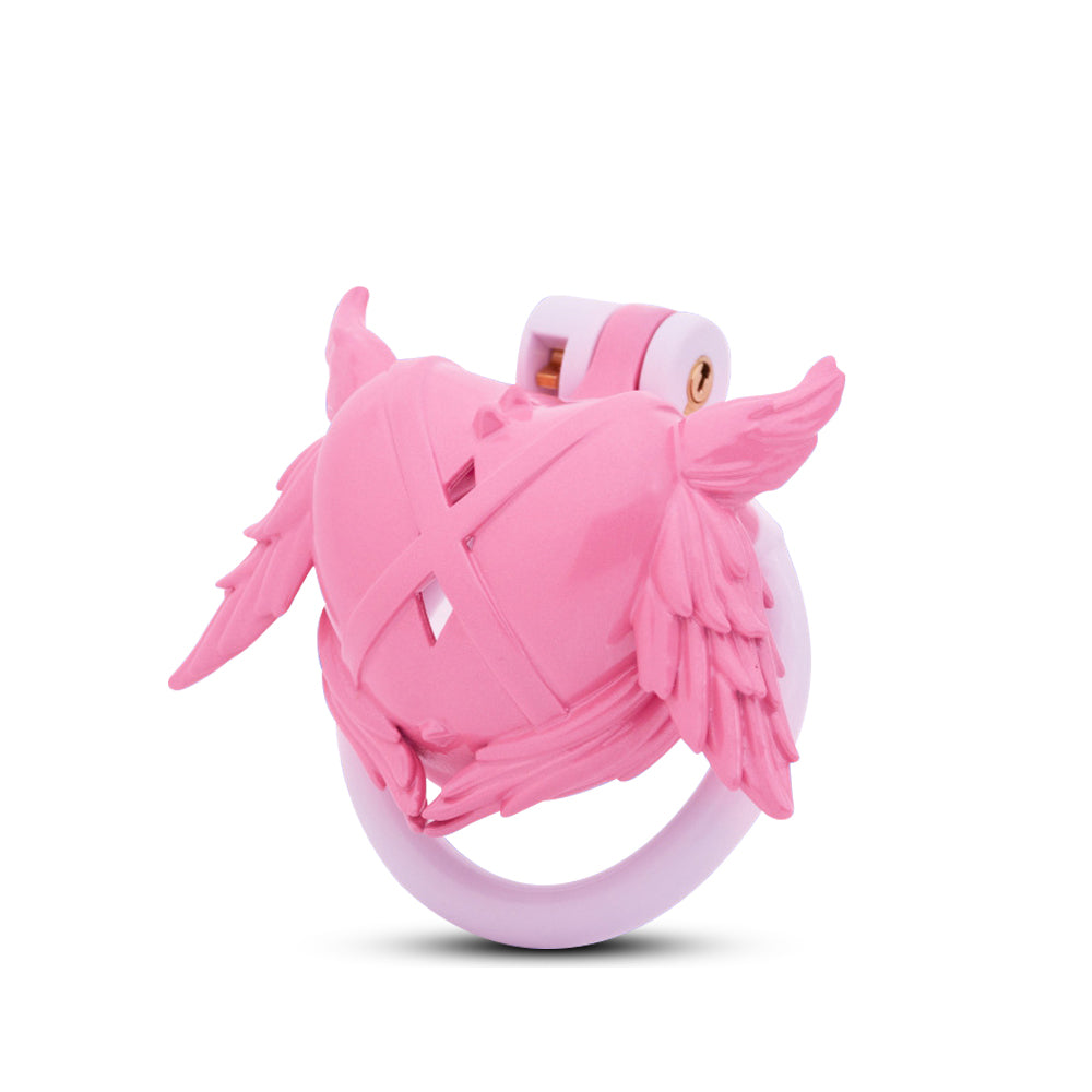 Pink winged heart-shaped ring toy with smooth band and detailed sculpted design