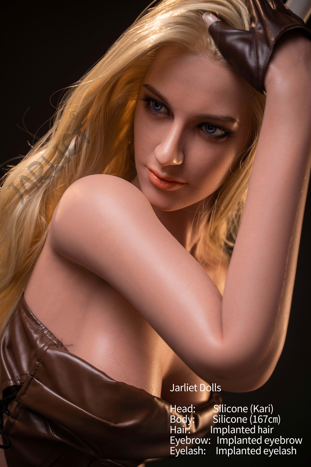 Jarliet Doll 167 cm B Silicone - Kari, a close-up profile shot showing her blonde hair and blue eyes, wearing a brown leather-style top and a fingerless glove.
