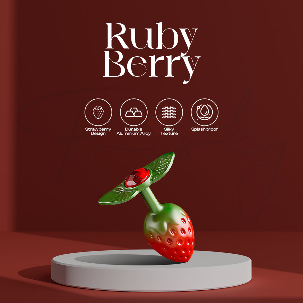 Ruby Berry strawberry-inspired accessory displayed on pedestal with rich red background