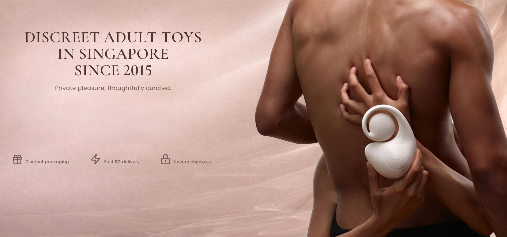 Person holding a discreet adult toy with promotional text about toys in Singapore since 2015.