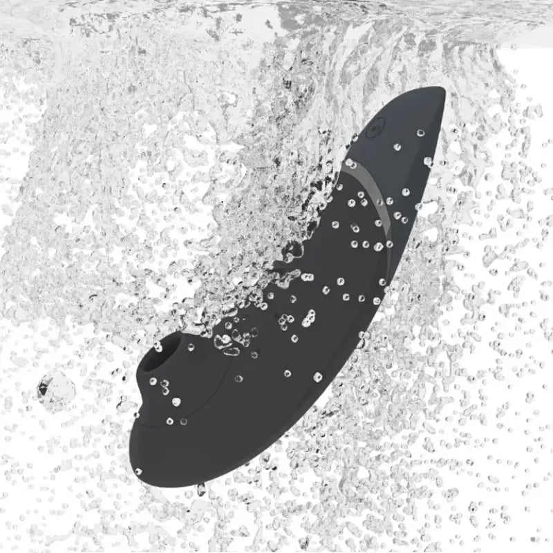 Womanizer Next Black ergonomic curved design comfortable handheld use travel friendly wellness device Singapore