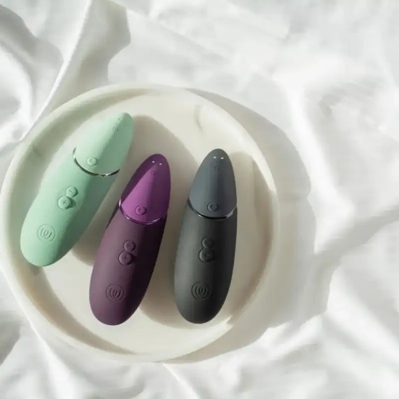 Womanizer Next Black smooth silicone finish body safe materials soft touch ergonomic handheld design Singapore