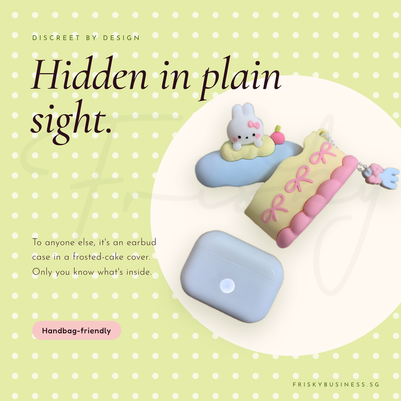 Bunny Cake suction pod next to its discreet white case, which looks like an everyday earbud case