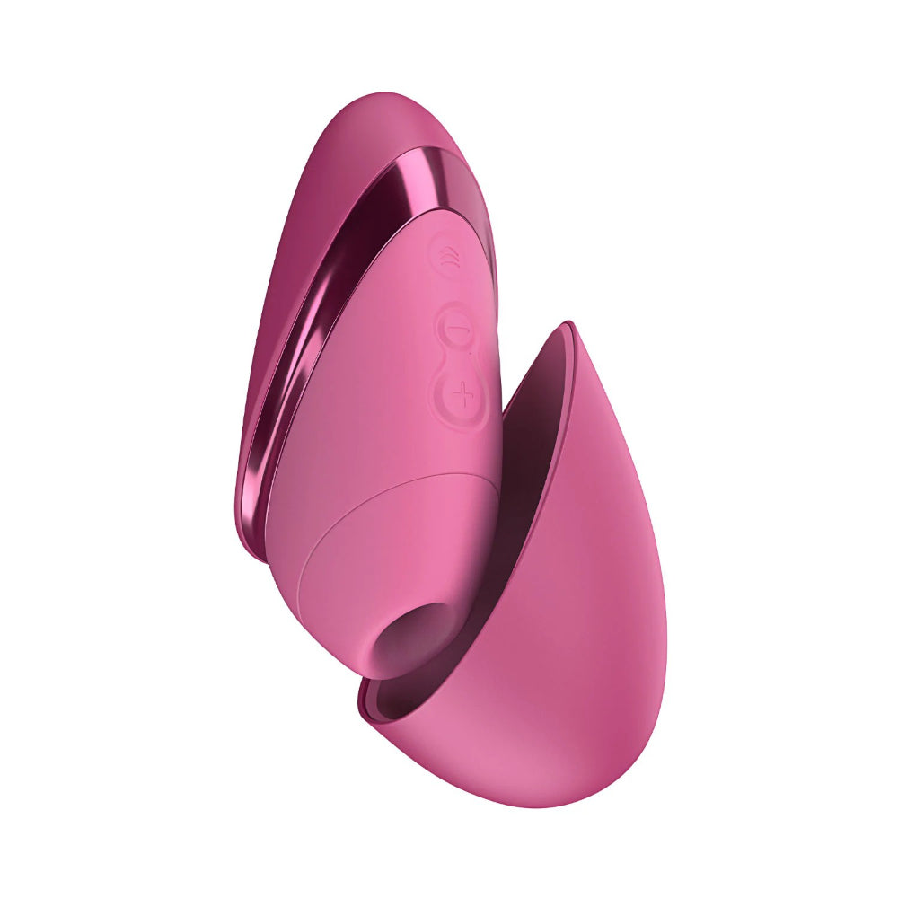 Womanizer Next Liberty clitoral stimulator in pink with ergonomic silicone body and Pleasure Air technology.
