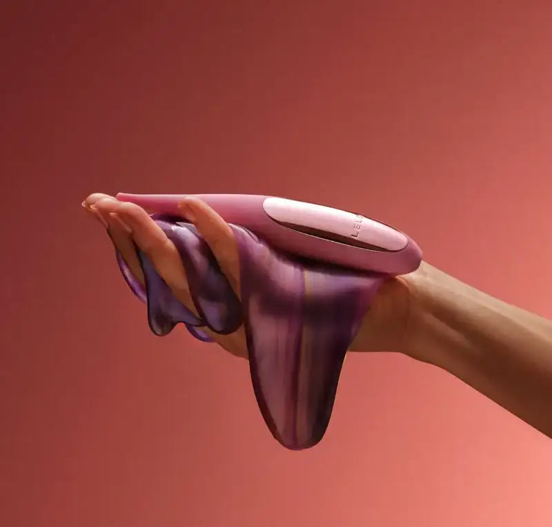 LELO Dot Travel Rechargeable Clitoral Pinpoint Vibrator Pink lightweight mini massager with ergonomic shape for comfortable and precise stimulation Singapore