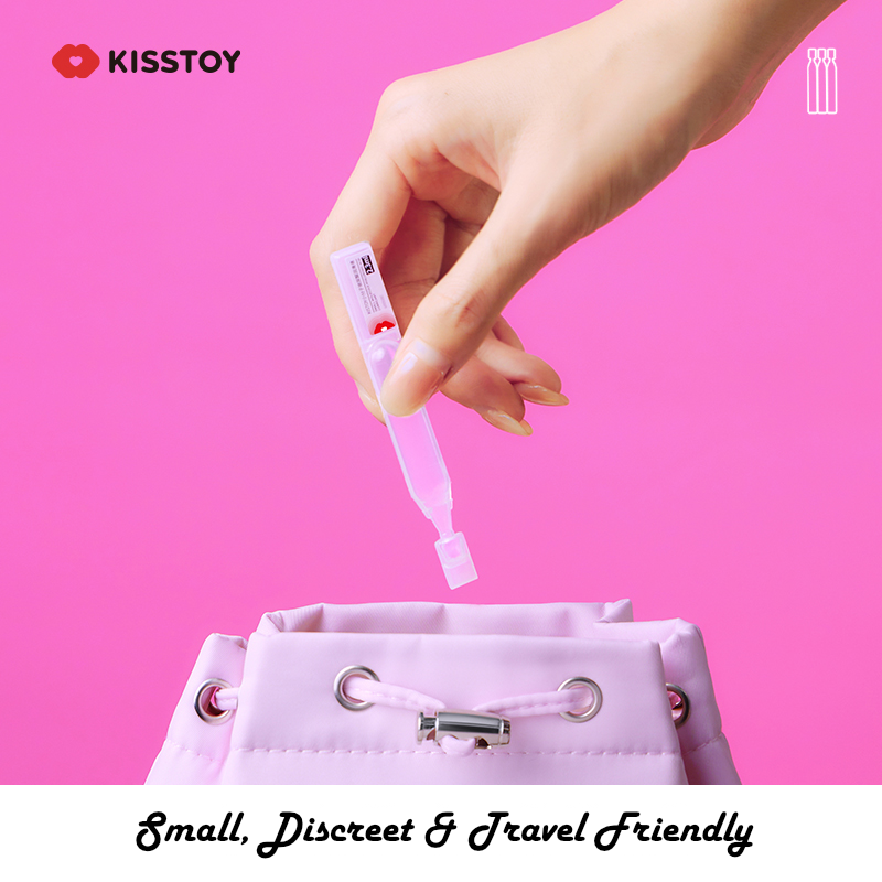 Hand lifting a lubricant vial from a pink box, captioned small, discreet and travel-friendly