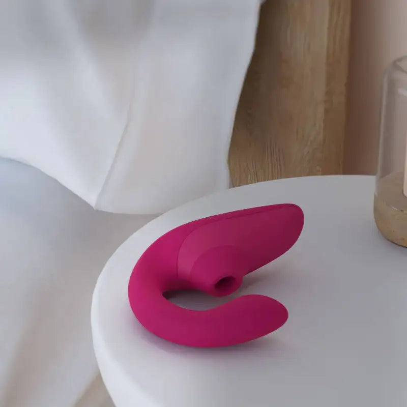 Womanizer Blend Vibrant Pink versatile personal wellness device premium silicone exterior ergonomic handheld design Singapore