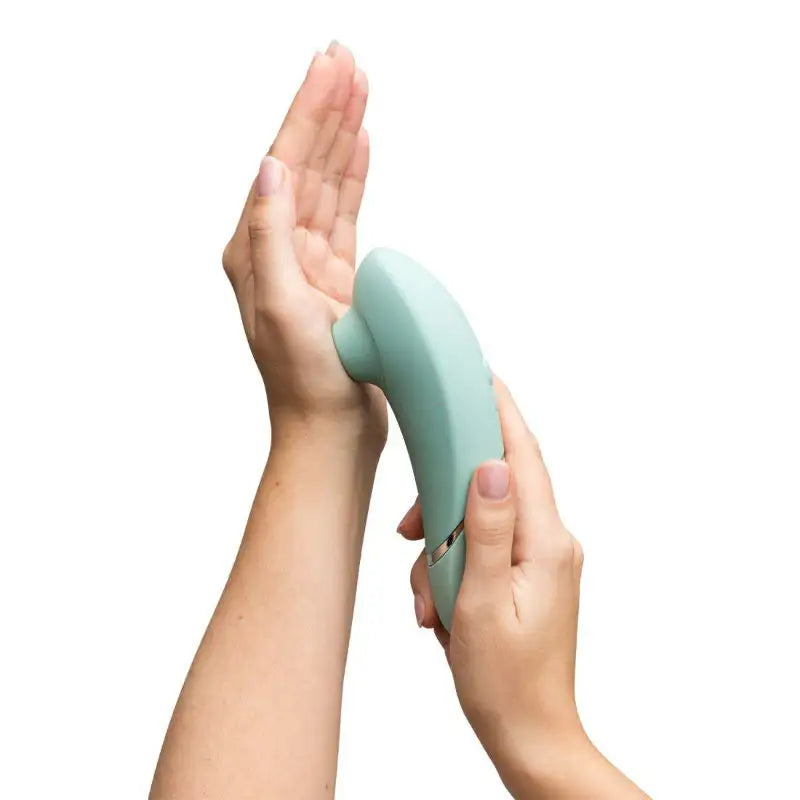Womanizer Next Sage elegant soft touch finish sustainable silicone body compact modern wellness device Singapore