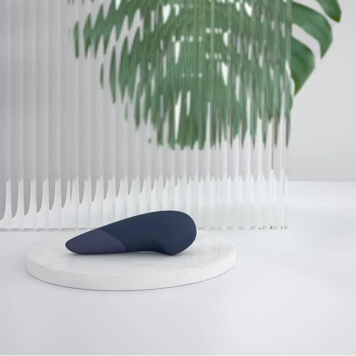 Womanizer Vibe Dark Blue premium silicone finish ergonomic compact design handheld personal wellness massager Singapore