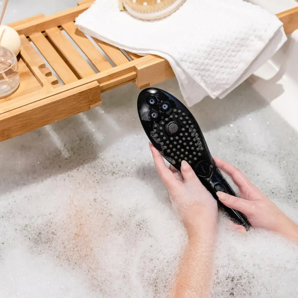 Womanizer Wave Black ergonomic curved design lightweight portable personal wellness massager for home or travel compact Singapore