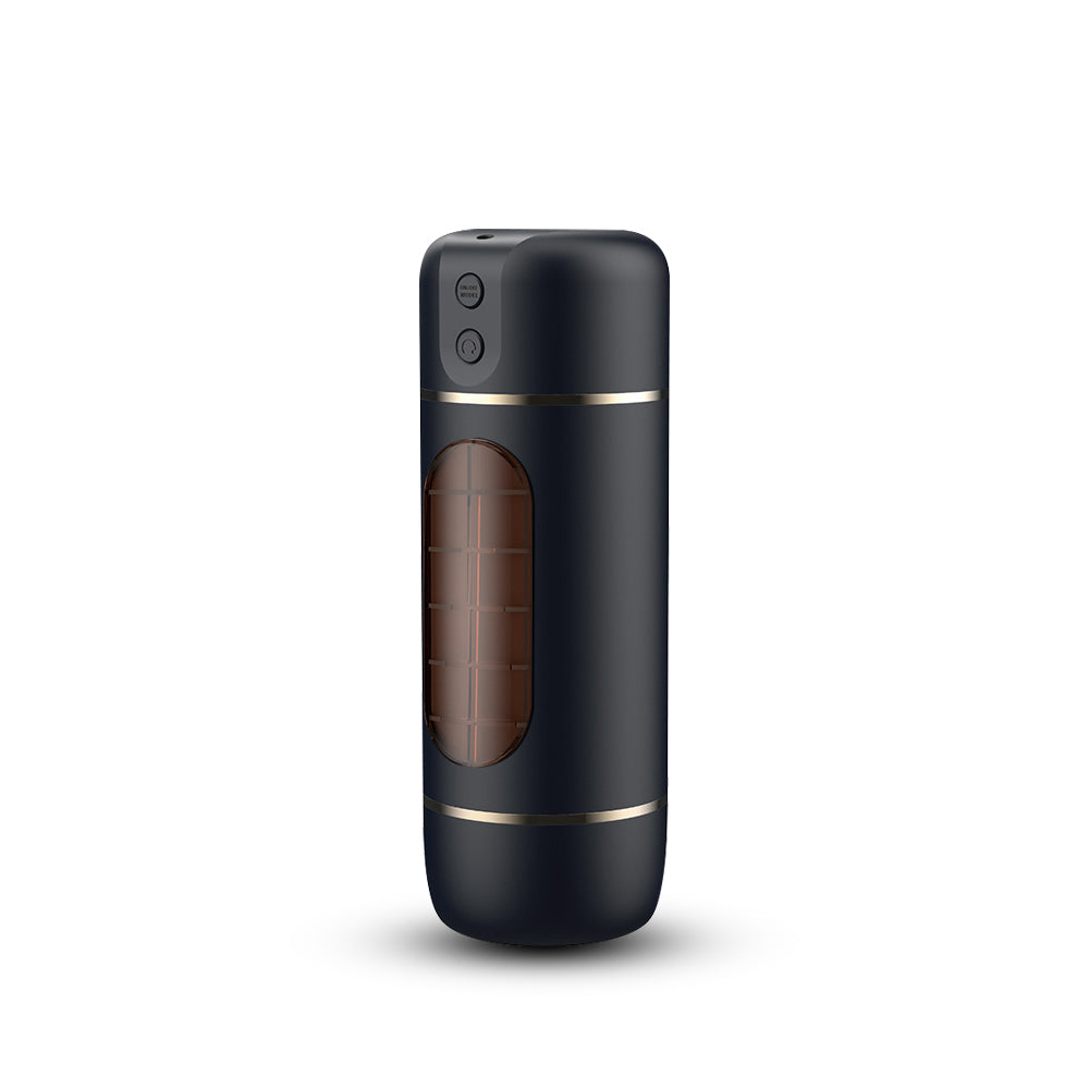 Fluxion masturbator in sleek black design with gold accents and textured grip panel.