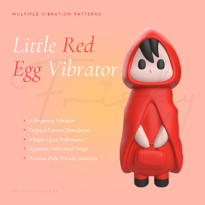Red egg-shaped vibrator with cartoon face on a pink background