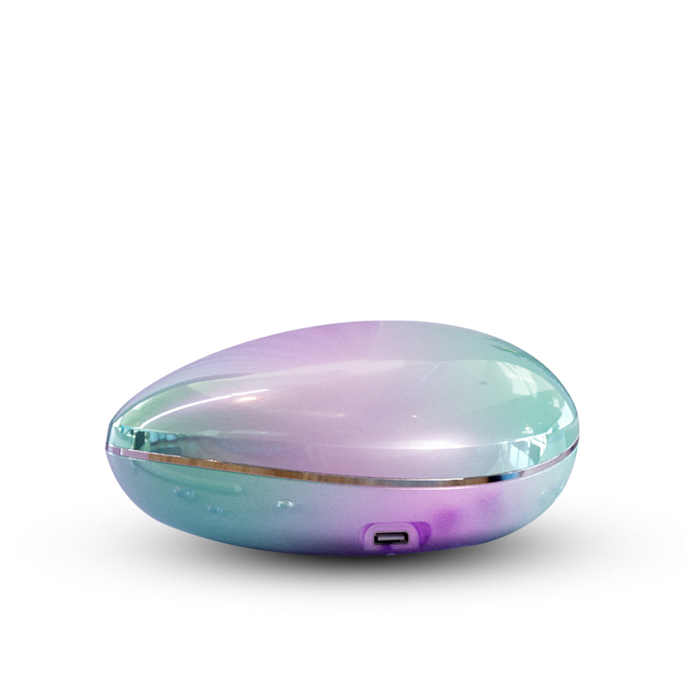 Lumi Shell suction vibrator in pastel tones showing sleek design and soft silicone surface.
