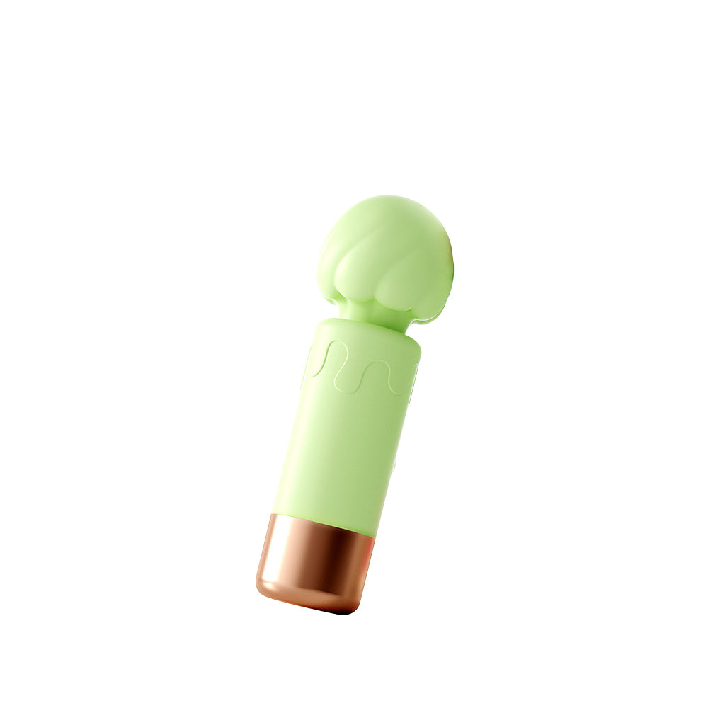 Mint-green mini vibrator with rounded head and rose-gold base on white background.