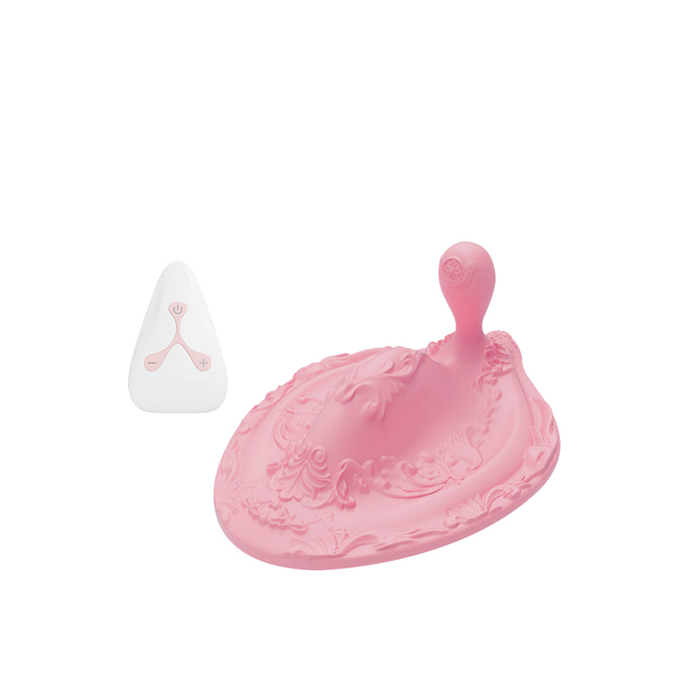 Mystic Flame pink stimulation mat with attached anal vibrator and wireless remote control.