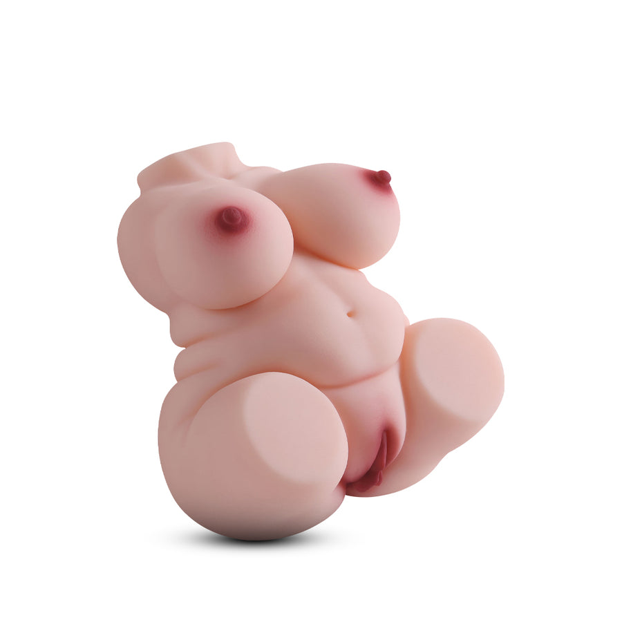 Realistic compact torso toy in natural skin tone with detailed chest and soft contours