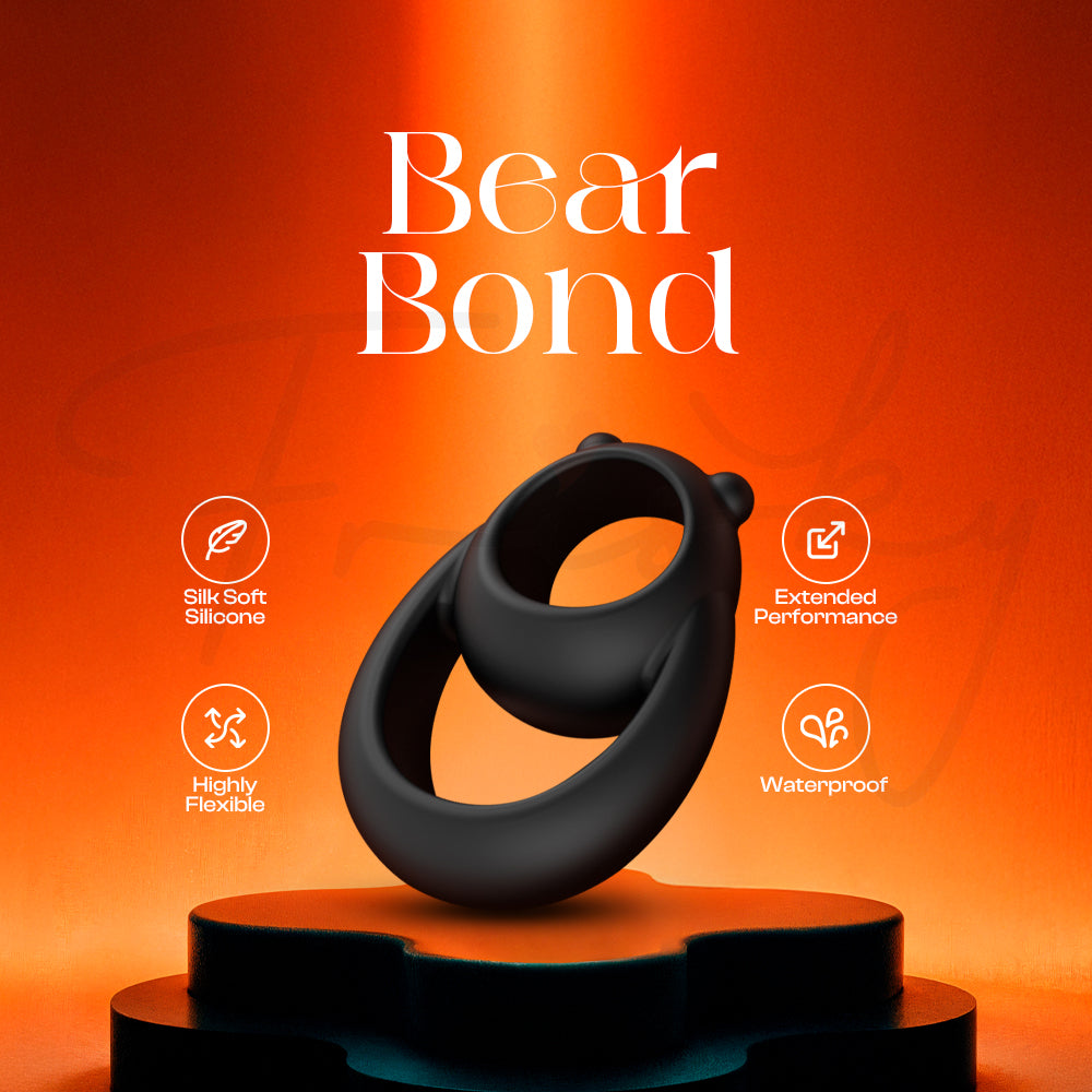 Bear Bond silicone cock ring displayed on podium with orange background