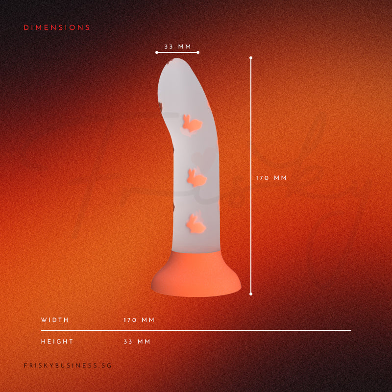 Bloom Glow toy showing its slim design, orange base, and soft silicone body
