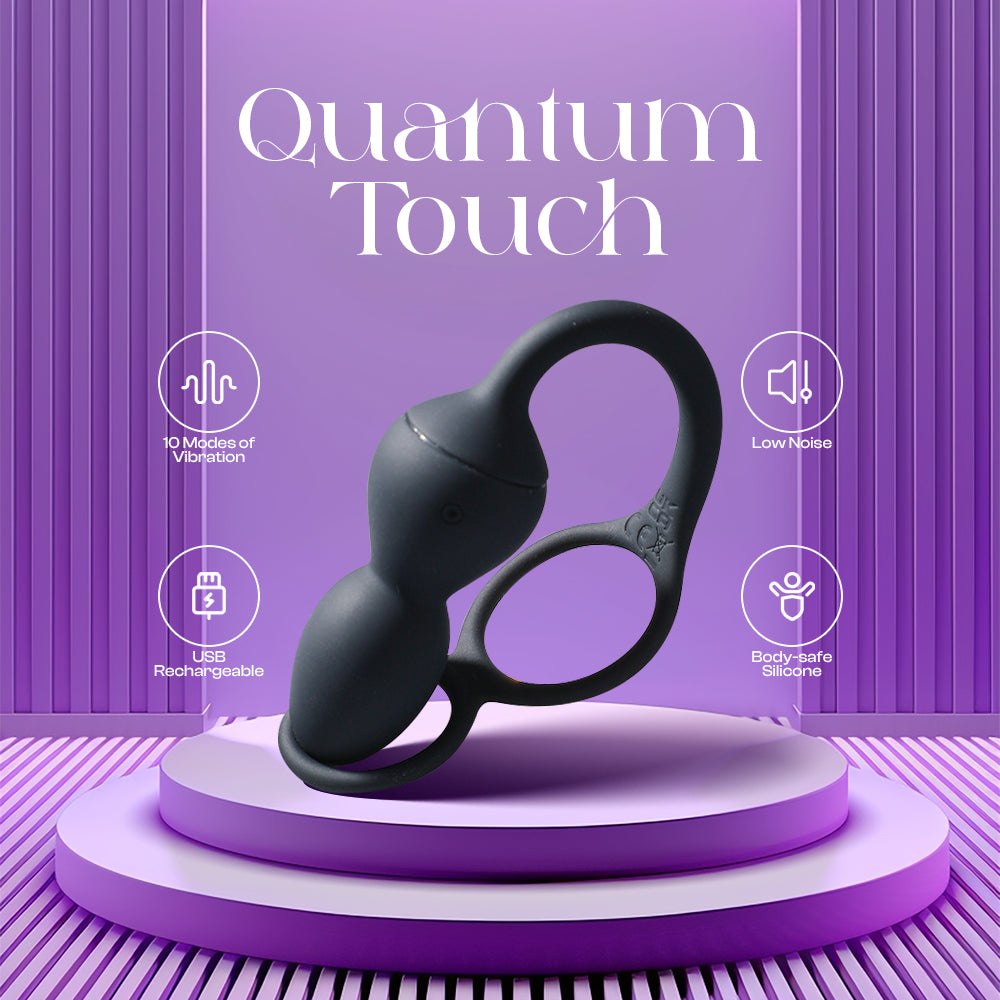 Quantum Touch branded packaging showing sleek black anal beads on a purple display background