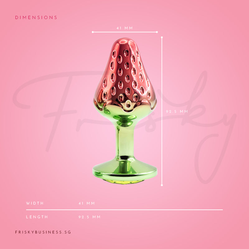 Strawberry-shaped metal plug shown upright with polished decorative finish
