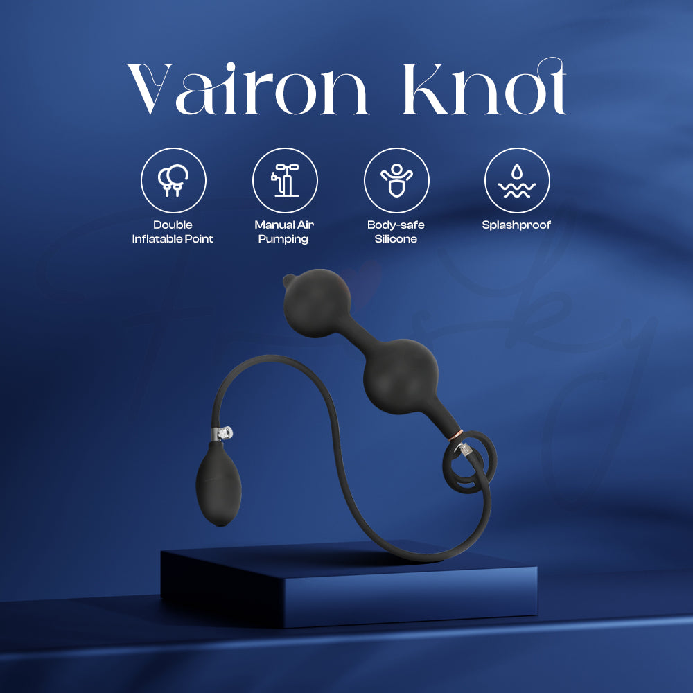 Elegant display of Vairon Knot inflatable plug showing premium dual-ball design and air pump.
