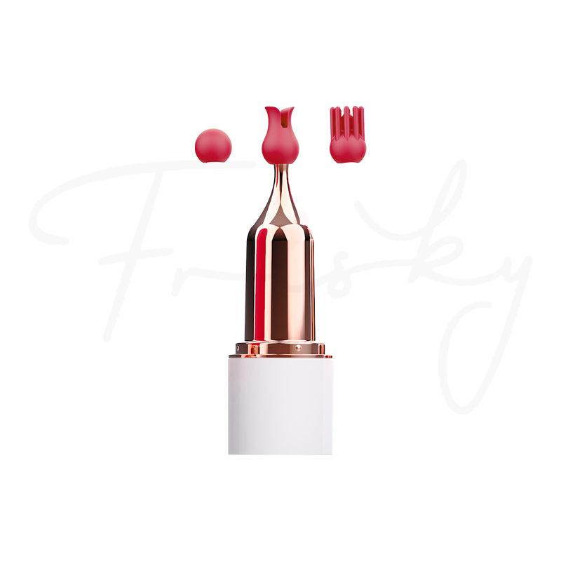 Bullet vibrator with a pink silicone tip attachment and rose-gold ring on white