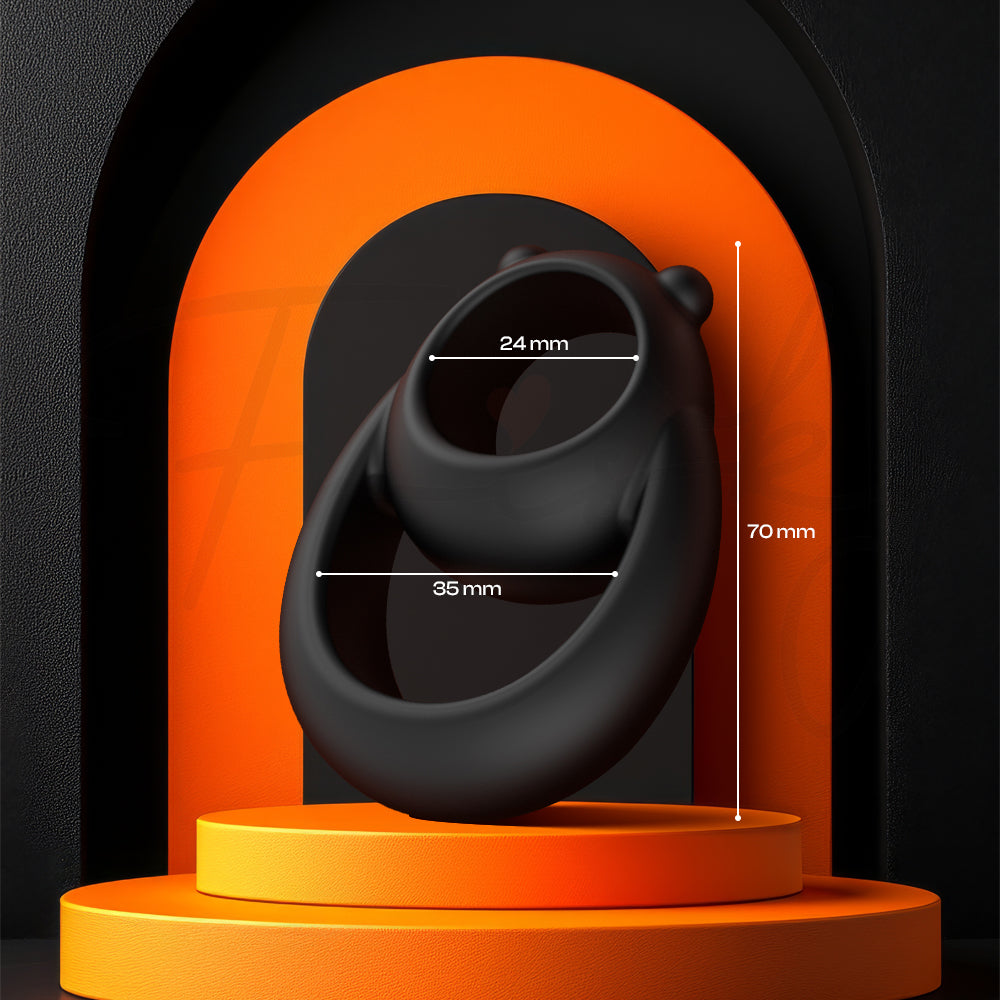 Silicone cock ring standing upright in modern illuminated display frame