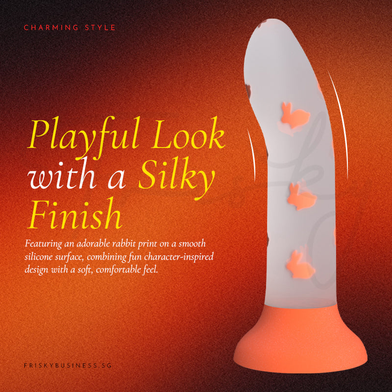 Bloom Glow silicone toy with playful butterfly accents and smooth curved design