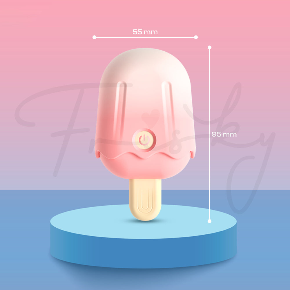 Ice cream style clitoral suction vibrator standing upright on soft pastel background
