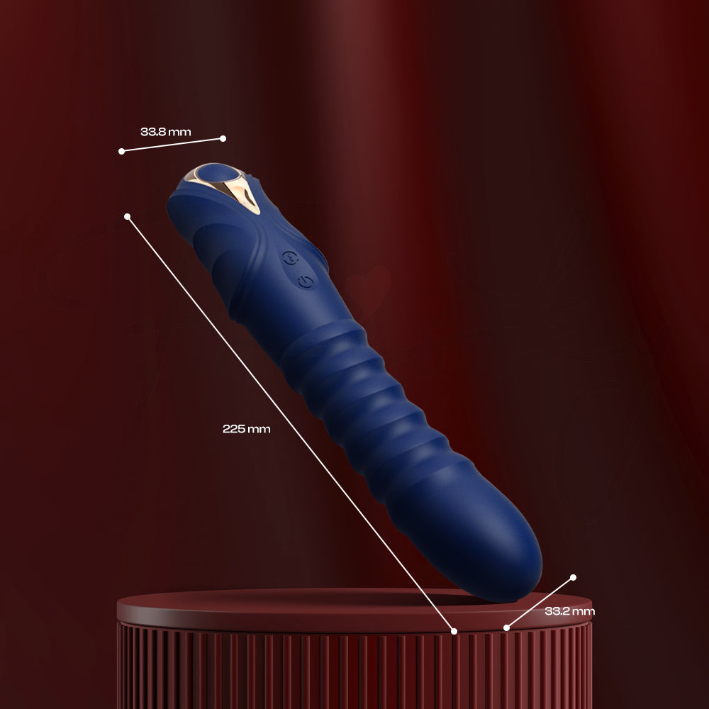 Close-up side angle of the navy Indigo Motion vibrator showing sleek shape and contours.