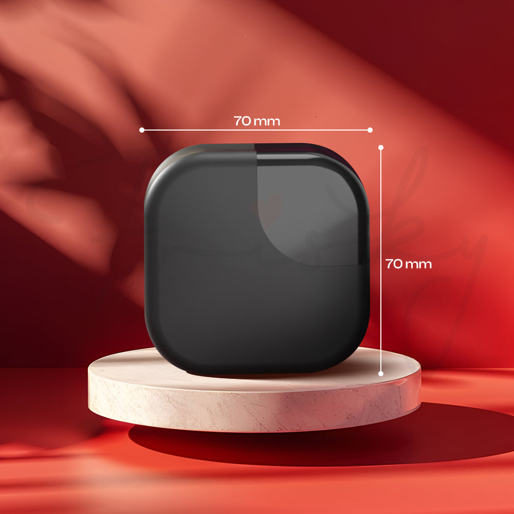 Compact cube-shaped suction vibrator standing upright on round display base